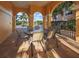 Community patio with seating and nearby pool view at 157 Tampa E Ave # 407, Venice, FL 34285