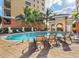 Relaxing community pool area with comfortable seating at 157 Tampa E Ave # 407, Venice, FL 34285