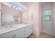 Bathroom boasts double vanity and shower at 1630 Monarch Dr, Venice, FL 34293