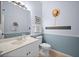 Charming bathroom with updated vanity and toilet at 1630 Monarch Dr, Venice, FL 34293