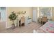Bedroom featuring twin beds and built-in desks at 1630 Monarch Dr, Venice, FL 34293