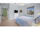 Bedroom with full-size bed and en-suite bathroom at 1630 Monarch Dr, Venice, FL 34293
