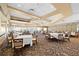 Elegant community room with tables and chairs, suitable for events at 1630 Monarch Dr, Venice, FL 34293