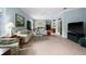 Open and airy living room with ample natural light and comfortable seating at 1630 Monarch Dr, Venice, FL 34293