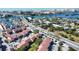 Complex near the water with parking and surrounding buildings at 1640 Stickney Point Rd # 202, Sarasota, FL 34231