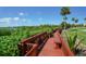 Wooden boardwalk path along waterfront at 1640 Stickney Point Rd # 202, Sarasota, FL 34231