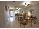 Entryway with tiled floor and view of dining area at 1640 Stickney Point Rd # 202, Sarasota, FL 34231