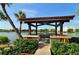 Waterfront gazebo offering scenic water views at 1640 Stickney Point Rd # 202, Sarasota, FL 34231