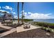 Relaxing patio area with table and waterfront view at 1640 Stickney Point Rd # 202, Sarasota, FL 34231