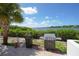 Enjoy grilling with a waterfront view on this patio at 1640 Stickney Point Rd # 202, Sarasota, FL 34231