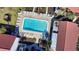 Community pool with surrounding lounge chairs at 1640 Stickney Point Rd # 202, Sarasota, FL 34231