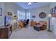 Spacious home office with large windows and comfortable seating at 1655 Lancashire Dr # 1655, Venice, FL 34293