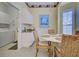 Laundry room with washer, dryer, and small table at 1655 Lancashire Dr # 1655, Venice, FL 34293