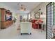Open living room showcasing comfortable seating and natural light at 1655 Lancashire Dr # 1655, Venice, FL 34293