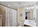 Updated bathroom with a shower/tub combo and vanity at 19155 Mangieri St, Venice, FL 34293