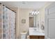 Clean bathroom with a shower/tub combo and updated vanity at 19155 Mangieri St, Venice, FL 34293