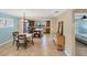 Bright dining area adjacent to the kitchen and living room at 19155 Mangieri St, Venice, FL 34293