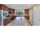 Modern kitchen with stainless steel appliances and granite countertops at 19155 Mangieri St, Venice, FL 34293