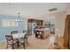Eat-in kitchen with stainless steel appliances and granite countertops at 19155 Mangieri St, Venice, FL 34293