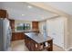 Spacious kitchen with island and stainless steel appliances at 19155 Mangieri St, Venice, FL 34293