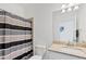 Clean bathroom with shower/tub combo and granite countertop at 1932 W Isles Rd, Port Charlotte, FL 33953