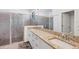 Bathroom boasts double sinks, granite countertop, and a large walk-in shower at 1932 W Isles Rd, Port Charlotte, FL 33953