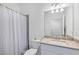 Simple bathroom with shower/tub combo and granite countertop at 1932 W Isles Rd, Port Charlotte, FL 33953