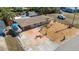 Aerial view of single-story home with boat parking and canal access at 1985 Fairview Dr, Englewood, FL 34223