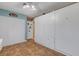 Bedroom with built-in wall bed and tiled floor at 1985 Fairview Dr, Englewood, FL 34223