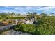 Nice boat dock with wooden walkway leading to the water at 1985 Fairview Dr, Englewood, FL 34223