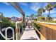 Long wooden walkway leads to a private boat dock at 1985 Fairview Dr, Englewood, FL 34223