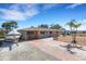 Updated single-story home with a landscaped yard, brick paver driveway and boat parking at 1985 Fairview Dr, Englewood, FL 34223