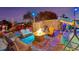 Relaxing firepit area with seating and lights at 1985 Fairview Dr, Englewood, FL 34223