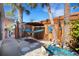 Relaxing hammock area with a tranquil water feature at 1985 Fairview Dr, Englewood, FL 34223