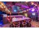 Night view of a hot tub with tiki bar and lighting at 1985 Fairview Dr, Englewood, FL 34223