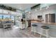 Open kitchen with granite countertops and island, seating area at 1985 Fairview Dr, Englewood, FL 34223