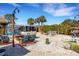 Spacious patio with firepit and comfortable seating at 1985 Fairview Dr, Englewood, FL 34223