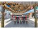 Covered Tiki bar with barstools and fun decorations at 1985 Fairview Dr, Englewood, FL 34223