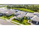 Luxury home community with lakefront properties and lush landscaping at 19854 Bridgetown Loop, Venice, FL 34293