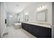Spa-like bathroom featuring a soaking tub and walk-in shower at 19854 Bridgetown Loop, Venice, FL 34293
