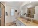 Bathroom with shower, toilet, vanity, and large mirror at 199 Palm Air Dr, Osprey, FL 34229