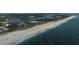 Stunning aerial view of a pristine beach and coastline at 199 Palm Air Dr, Osprey, FL 34229