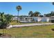 Community bocce ball courts with covered seating areas at 199 Palm Air Dr, Osprey, FL 34229