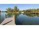 Relaxing waterfront dock with boat slips and access to the calm waters at 199 Palm Air Dr, Osprey, FL 34229