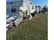 Storm damaged manufactured home with roof and siding damage at 199 Palm Air Dr, Osprey, FL 34229