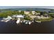 Aerial view of a marina with numerous boats and waterfront views at 199 Palm Air Dr, Osprey, FL 34229