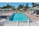 Community pool with patio and seating at 199 Palm Air Dr, Osprey, FL 34229