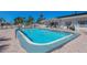 Community pool with patio and seating at 199 Palm Air Dr, Osprey, FL 34229