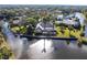 Stunning waterfront property surrounded by lush landscaping at 20 Saint Croix Way, Englewood, FL 34223