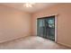 Bright bedroom with sliding door to patio at 20 Saint Croix Way, Englewood, FL 34223